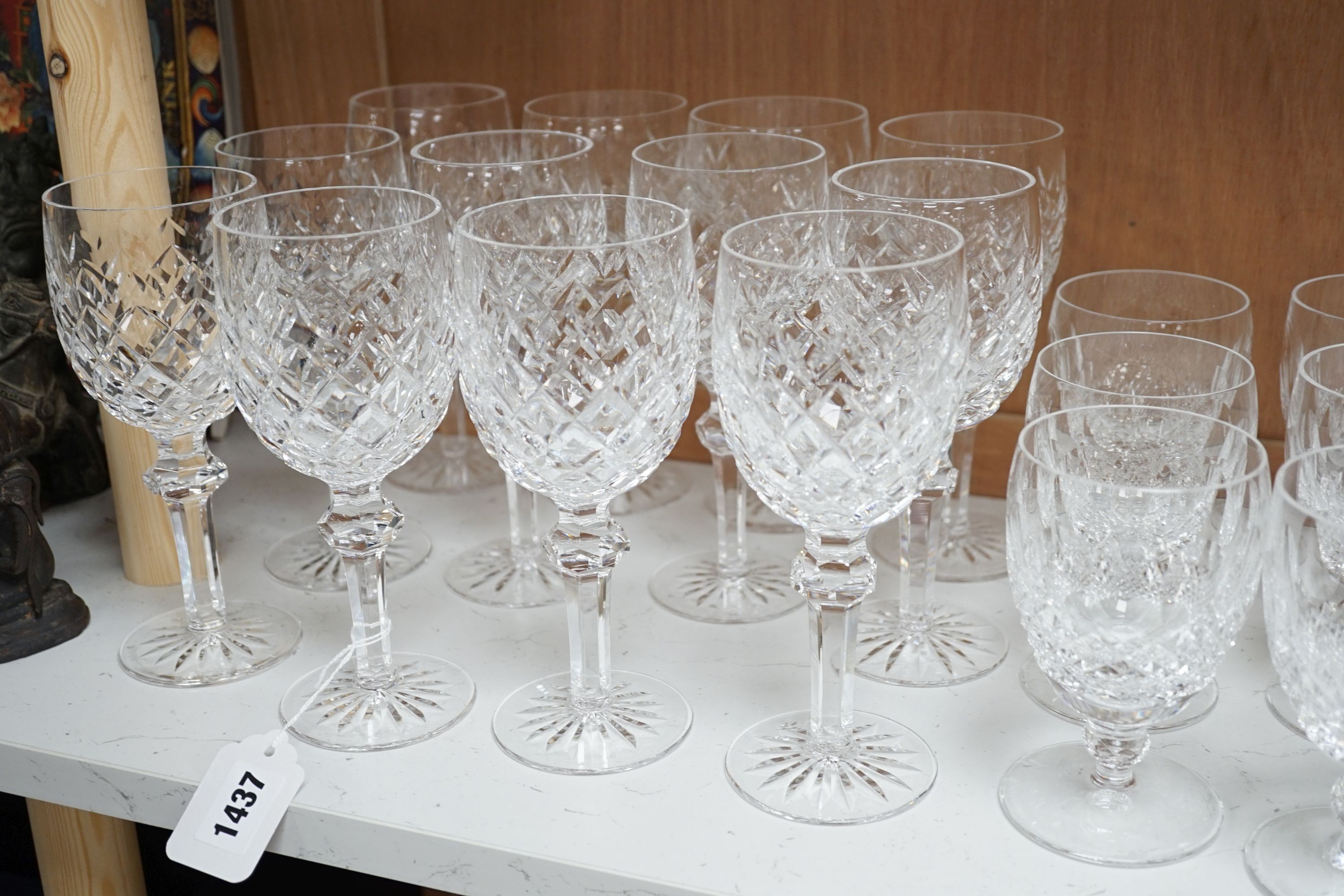 A set of eighteen Waterford cut crystal low goblets and tumblers and twelve further Waterford cut crystal wine glasses in a different pattern